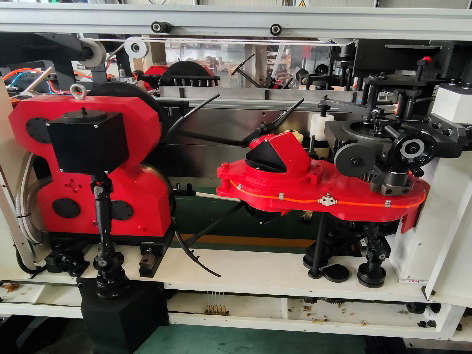 Vacuum opening & bottom forming unit